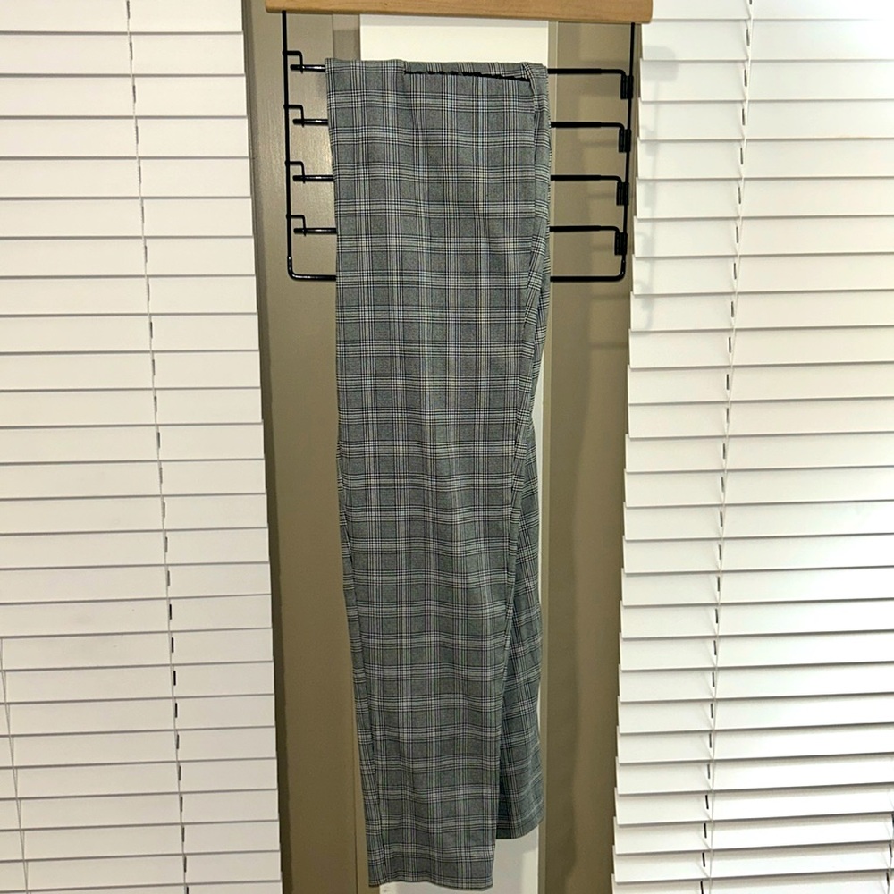 Black, gray, and white dress pants